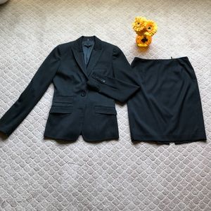 Tahari black pinstripe suit (jacket and skirt)